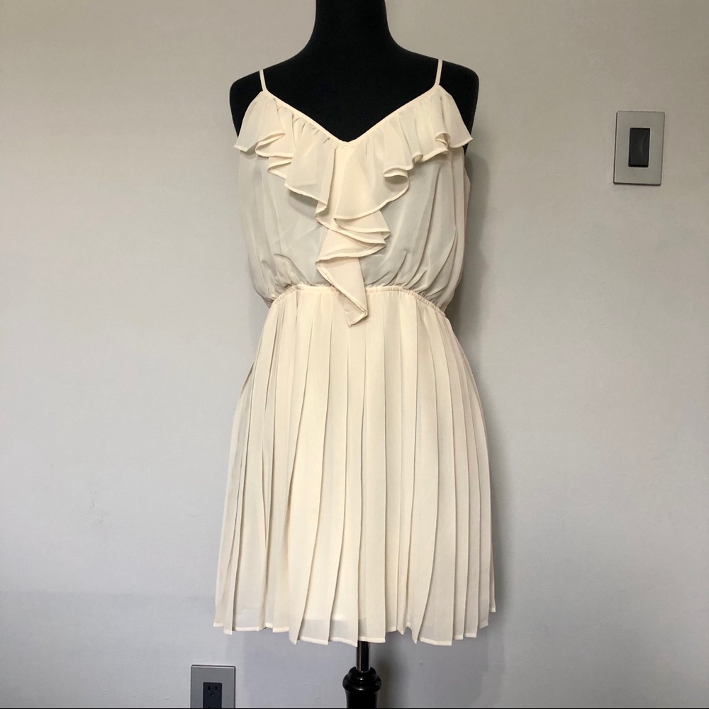 BCBGeneration cream colored dress with ruffles